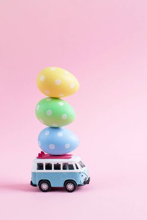Riga, Latvia - March 04 2019: Hippie Bus with Easter Eggs on the Roof Miniature Small Car Bannerのeditorial素材
