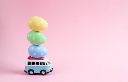 Riga, Latvia - March 04 2019: Hippie Bus with Easter Eggs on the Roof Miniature Small Car Bannerのeditorial素材