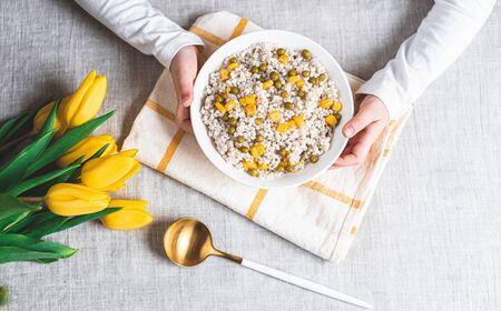 Pearl barley porridge with vegetables, healthy food concept, breakfastの写真素材
