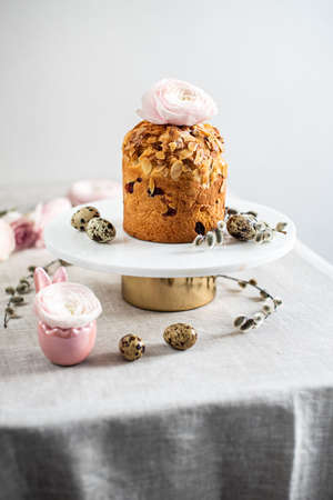 Easter composition with cake, eggs and flowers. Easter holiday conceptの写真素材