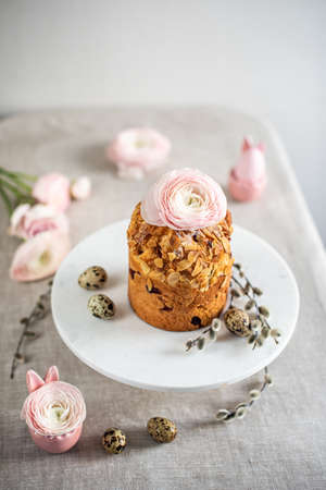 Easter composition with cake, eggs and flowers. Easter holiday conceptの写真素材