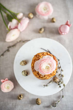 Easter composition with cake, eggs and flowers. Easter holiday concept