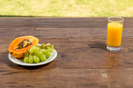 Cornmeal cake on rustic wooden table, top view and with space for text.の写真素材