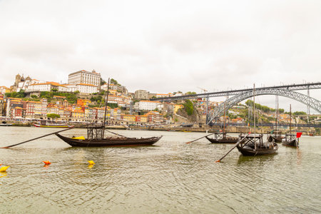 Douro River in Portugal, with boat and view of the city of Porto in Portugal.の写真素材