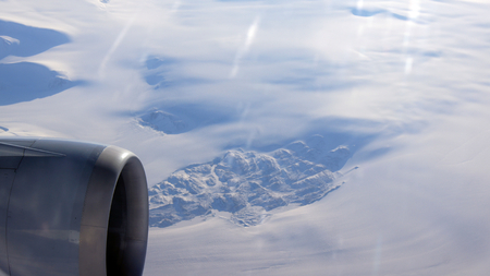 Greenland as seen from the sky out of an airplaneの写真素材
