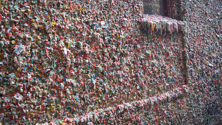 The Market Theater Gum Wall in downtown Seattle on October 10, 2014. It is a local landmark in downtown Seattle, in Post Alley under Pike Place Market.の写真素材