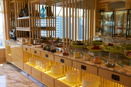 SINGAPORE - JULY 23rd, 2016: inside of a lounge at 5 star luxury hotel the Marina Bay, variety canape and exclusive food.のeditorial素材