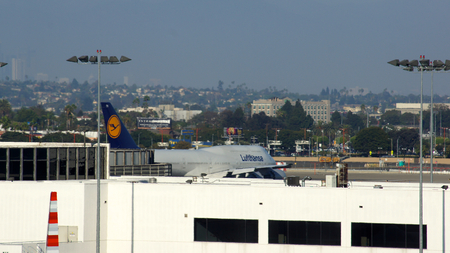 LOS ANGELES, CALIFORNIA, UNITED STATES - OCT 8, 2014: An Lufthansa Jumbo Jet Boeing 747 plane parked at LA International Airport LAX after arriving from Frankfurtのeditorial素材