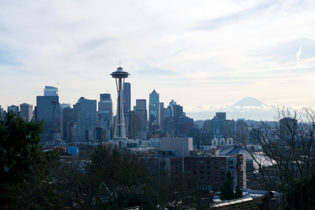 SEATTLE, WASHINGTON, USA - JAN 23rd, 2017: Seattle skyline panorama seen from Kerry Park during the morning light with Mount Rainier in the background.のeditorial素材