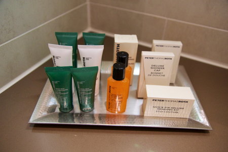 MAINZ, GERMANY - JUL 7th, 2017: Shower amenity set at a luxury hotel, A bar of soap, shampoo and body lotionのeditorial素材