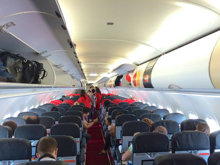 KUALA LUMPUR, MALAYSIA - APR 4th 2015: interior of AirAsia Airbus A320-200 cabin, AirAsia Berhad is...