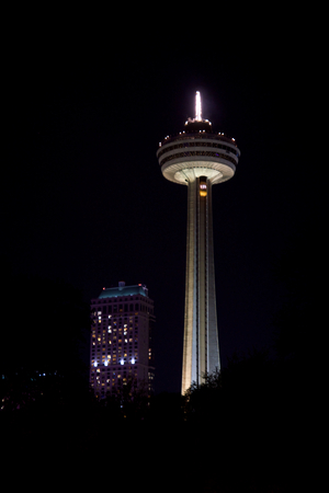 NIAGARA FALLS, ONTARIO, CANADA - MAY 21st 2018: The Skylon Tower, Casino and hotels at Niagara Falls at nightのeditorial素材