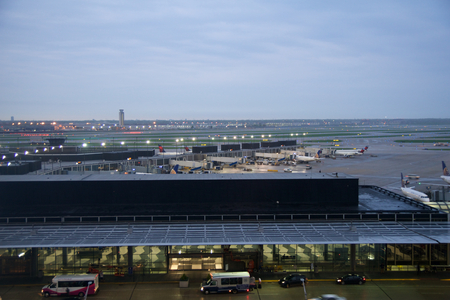 CHICAGO, ILLINOIS, UNITED STATES - MAY 11th, 2018: Several airplanes at the gate at Chicago OHare International Airport in the early morningのeditorial素材