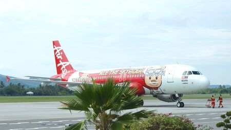KEDAH, LANGKAWI, MALAYSIA - APR 09th, 2015: Air Asia Airbus A320-200 MSN 2926 registration 9M-AFL at Langkawi Airport passenger terminalのeditorial素材
