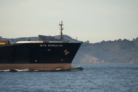 SAN FRANCISCO, CALIFORNIA, UNITED STATES - NOV 25th, 2018: Cargo Ship NYK ROMULUS entering the San...