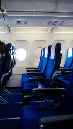 COPENHAGEN, DENMARK - JUL 06th, 2015: SAS aircraft cabin interior with no passengers.のeditorial素材