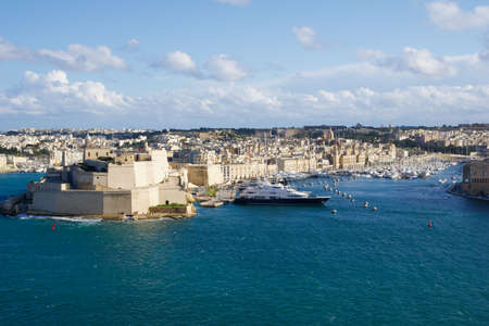 VALLETTA, MALTA - DEC 31st, 2019: The mighty Fort St Angelo dominates Grand Harbour of Valetta with shipsのeditorial素材
