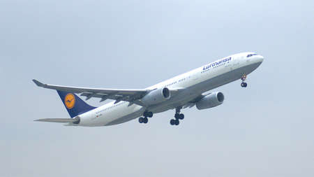 MUNICH, GERMANY - 11 OCTOBER 2015: Lufthansa Airbus A330-343 takeoff the northern runway of the...