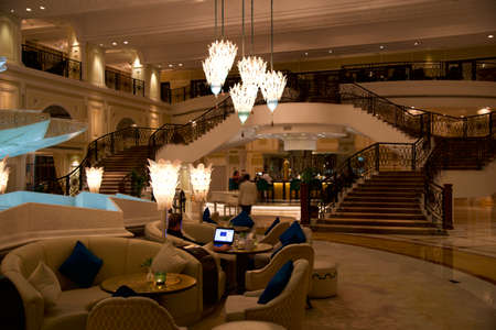 RAS AL KHAIMAH, UNITED ARAB EMIRATES - JUN 13, 2019: Opulent Arabian style Peacock Alley restaurant at 5-star luxury hotel with fountainのeditorial素材