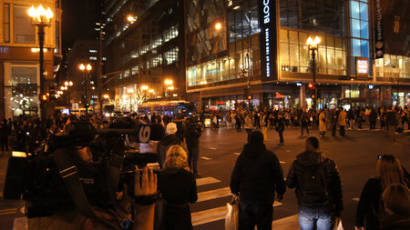 CHICAGO, ILLINOIS, UNITED STATES - Dec 12, 2015: Nighttime activity on Michigan Avenue in downtown Chicagoのeditorial素材