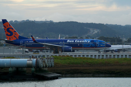 SAN FRANCISCO, CALIFORNIA, UNITED STATES - NOVEMBER 27, 2018: Sun Country Airline Boeing 737-800 on the apron en route to runway at San Francisco SFO International Airportのeditorial素材