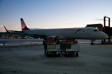 COPENHAGEN, DENMARK - 24 NOV 2018: Short-haul aircraft at the gate of Copenhagen Airport on a cold winter morning without snowのeditorial素材