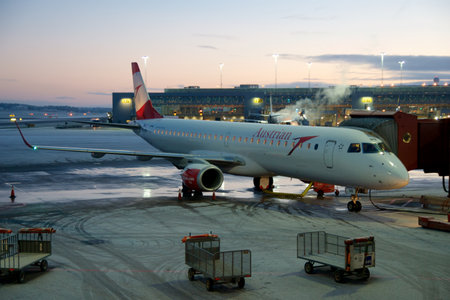 COPENHAGEN, DENMARK - 24 NOV 2018: Short-haul aircraft at the gate of Copenhagen Airport on a cold winter morning without snowのeditorial素材