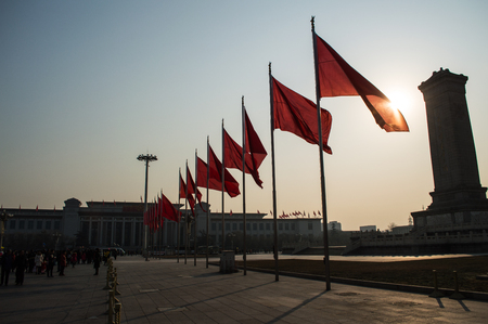 Chinese Flags Swaying in the Morning Breeze with Sunshine at Tiananmen Square, Beijing, Chinaのeditorial素材