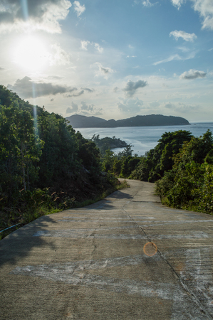 Road with Ocean View on Koh Pha Ngan, Thailandの写真素材