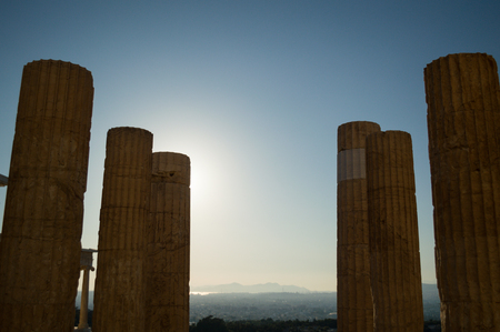 Columns, Pillars, Ruin of a Temple at the Acropolis with Athens Backdrop, Greeceの写真素材