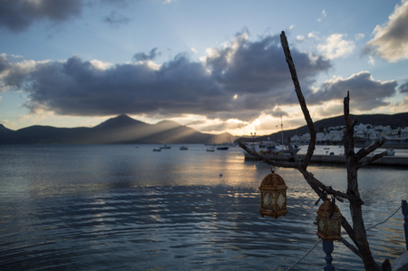 Sunset over Bay of Adamantas with Typical Whitewashed Houses, Milos, Greeceの写真素材
