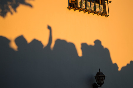 Shadows of People Gathering, Photographing, Sunset Watching in the Old Moorish Quarter Albaic?n, Granada, Spainの写真素材