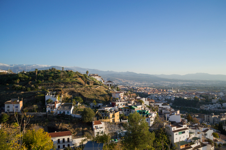 View from Carmen de los Martires Park over Granada and Sierra Nevada, Spainの写真素材