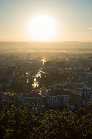 View from Carmen de los Martires Park over Granada, Genil River and Sierra Nevada, Spainの写真素材