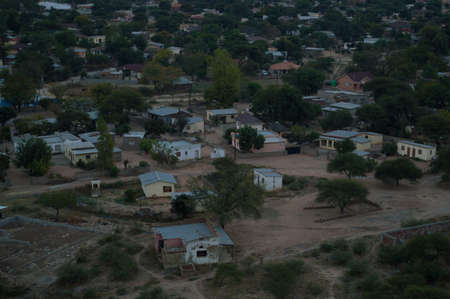 Sunset with Landscape and Cityscape seen from a Hill in Mochudi, Botswana, Africaの写真素材