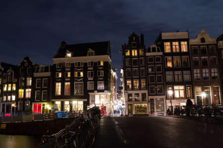 Traditional Dutch Canal Houses during New Year's Eve in Amsterdam, Netherlandsの写真素材