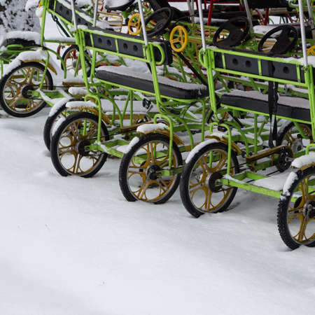 Green Bicycle Rikshaws during winter in Bishkek, Kyrgyzstanの写真素材