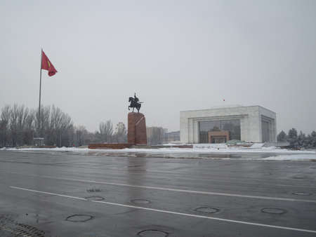Frunze Museum, Lenin Statue and Flag during Winter at Ala Too Square in Bishkek, Kyrgyzstanのeditorial素材
