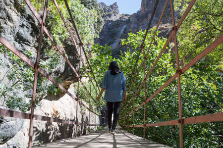 Bridge across Canyon during Circular del RÃ­o Monachil Hike near Granada, Spainの写真素材