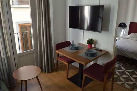 Living Room and Bedroom inside an Apartment in the City Center of Granada, Spainのeditorial素材
