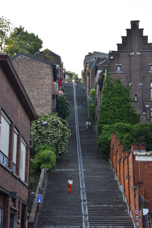 Cityscape in LiÃ¨ge, Belgium with Historic Residential Apartment Buildings and Giant Staircaseの写真素材