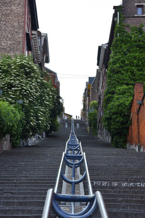 Cityscape in LiÃ¨ge, Belgium with Historic Residential Apartment Buildings and Giant Staircaseの写真素材