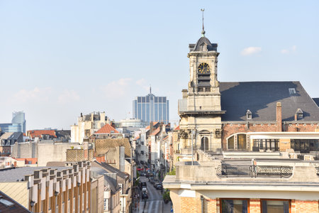 Cityscape in Brussels, Belgium with Historic Buildings and Clock Towerの写真素材