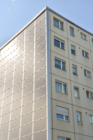 Apartment Building with Solar Panel Facade in the Countryside near Zurich, Switzerlandの写真素材