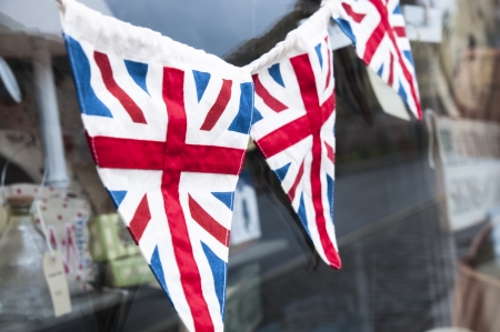 Union jack bunting being hung for Jubileeの写真素材