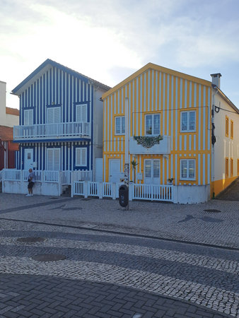 Colorful striped traditional houses in Costa Nova, Aveiro, Portugal.の写真素材