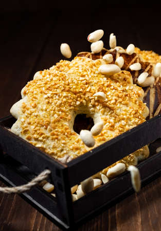 American Cookies. Sweet pastry biscuit cookies with peanuts. Black background.