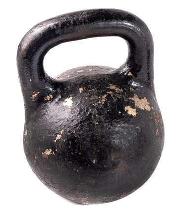 Old kettlebell weighing 24 kilograms isolated on white background.の写真素材