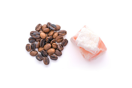 Roasted coffee beans and rahat lokum isolated over white backgroundの写真素材