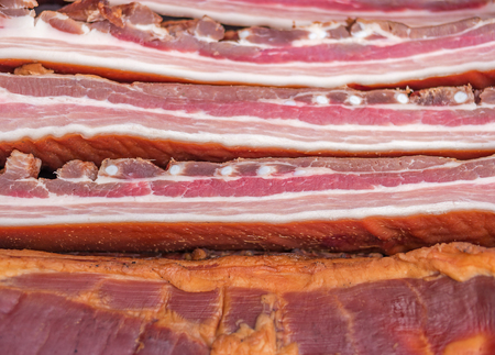Pile of smoked bacon, shallow focusの写真素材